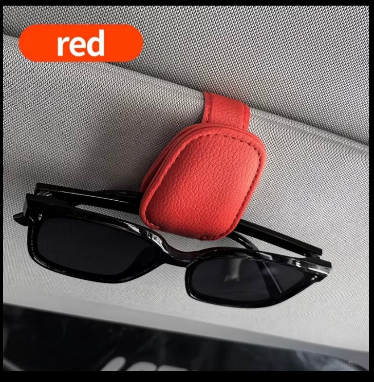 Sunglasses clip for visor