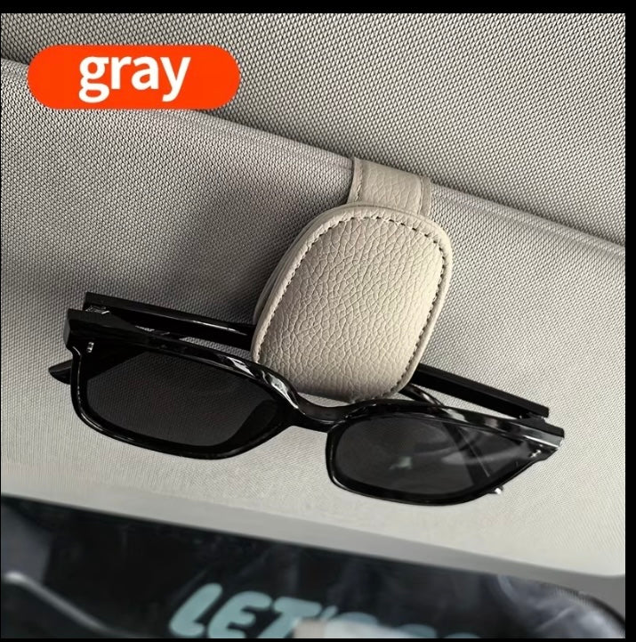 Sunglasses clip for visor