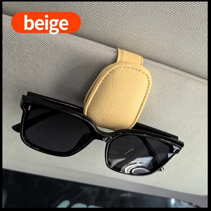 Sunglasses clip for visor