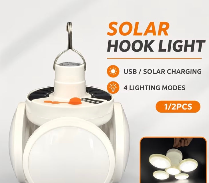 Solar powered light with hook to hang